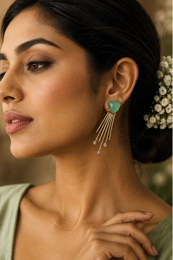 Model wearing the Emerald Comet Earrings